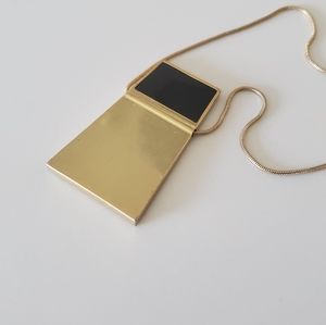Madewell gold necklace with modern pendant